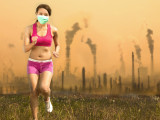 Woman was wearing a mask and running  on air pollution